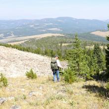 Skirting the east side of a rock field on the descent