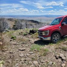 The truck turnaround / parking spot. Hmmm.. The road look a lot less rough in the photo than they did in person. Steens Mountain in the distance.