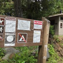 trailhead information and pit toilet 