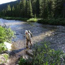 Crossing Straight Creek in late June during a low snowpack year