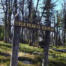Elk Peak Sign in ATV Parking Area - Off Trail Scramble Begins Here