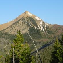 First views of Evans Peak along trail
