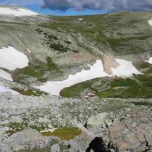 Close-up of cliff band and trail that leads to ramp
