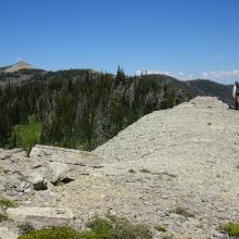 Traversing a shaley false summit along the ridge.  The true summit is in the distance.
