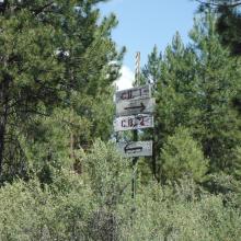 CB 1 Sign - righthand most road goes to summit