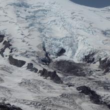 Closeup of Emmons Glacier on Mount Rainier, showing very low snow cover and exposed crevasses.