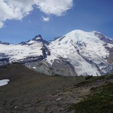 Looking back at Mount Rainier and Little Tahoma from summit ridge of Goat Island Mountain.