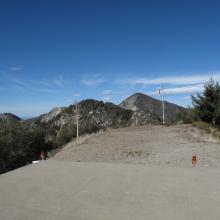 Arriving at Helipad.  Trail continues West from forward edge of concrete pad.