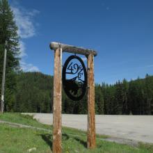 49 Degrees North Ski Resort - Sign at main parking area, mountain base.