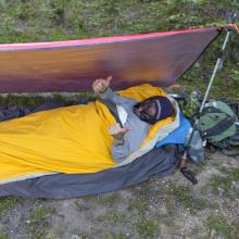 K7MAS settling into Bivi, with swarms of mosquitos!  Photo KG7EJT