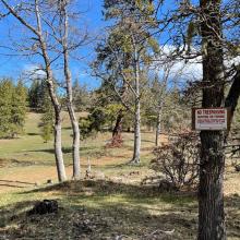 Clearly signed on both sides of access to summit