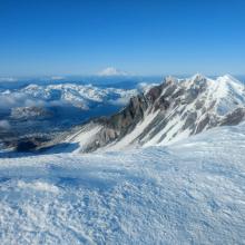 My wife's picture from the crater rim of St. Helens, with Rainier on the horizon