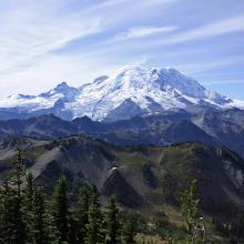 Looking SW, a view of Mt Rainier and Little Tahoma from the west side of the summit saddle.