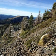 Coffin Mt in distance on the way back down